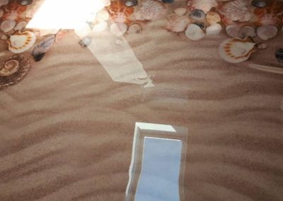Sol en résine epoxy effet plage